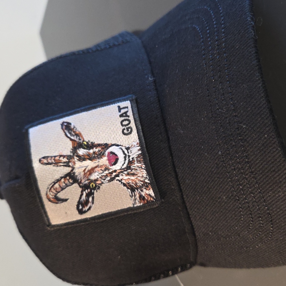 GOAT Embroidered Patch Black Trucker Cap